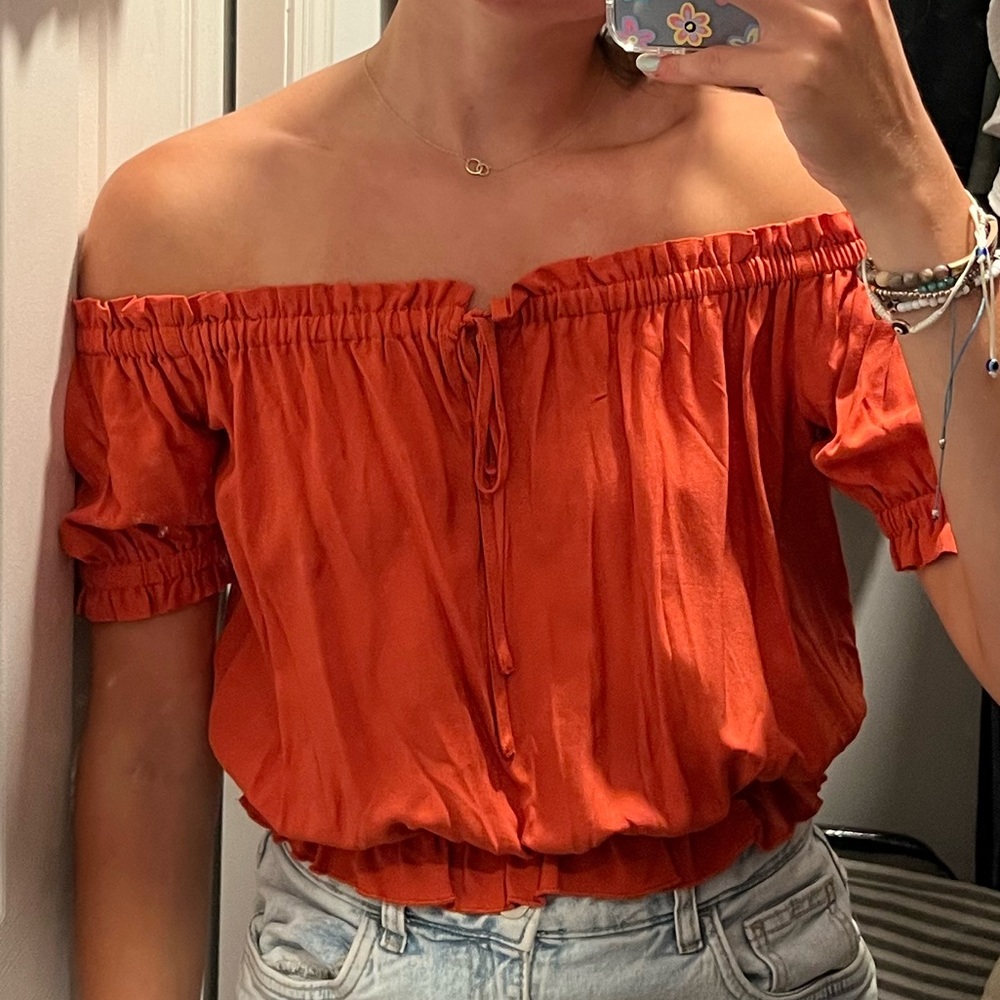 Orange off-the-shoulder top!